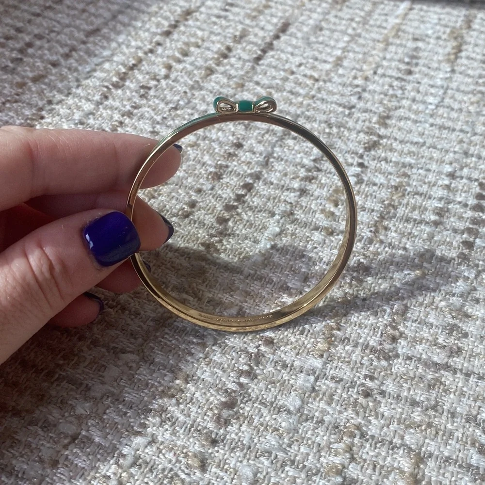 Kate Space Enamel Bow Bangle Bracelet - Picture 2 of 3